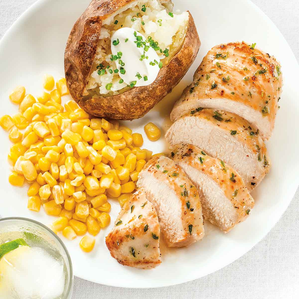 Pan Seared Chicken, Baked Potato and Steamed Corn with Wonder Water